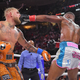 Tyron Woodley punches Jake Paul in their cruiserweight bout during a Showtime pay-per-view event at Rocket Morgage Fieldhouse on August 29, 2021 in Cleveland, Ohio.